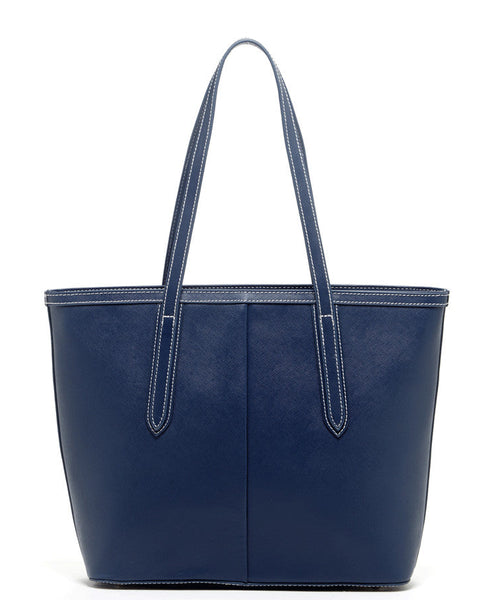Blue Saffiano leather Tote accented with metallic studs With Model.