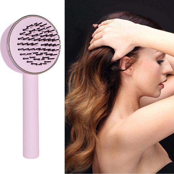 Air Cushion Massager Brush With Retractable Bristles Pink with side view of model
